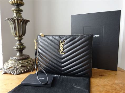 ysl black wristlet bag|YSL black bag with tassel.